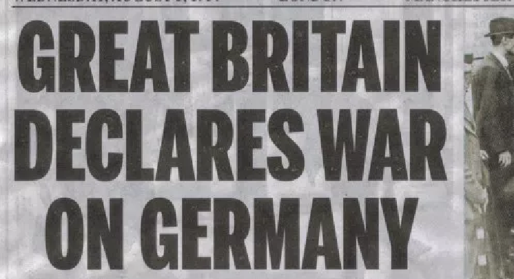 Newspaper caption saying "Great Britain declares war on Germany"